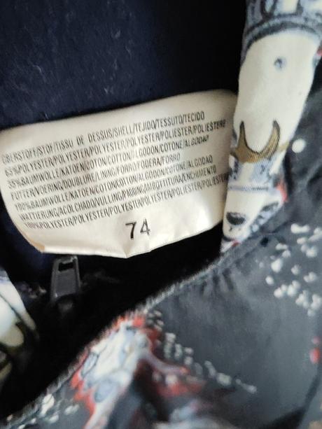 Prechodný overal, 74