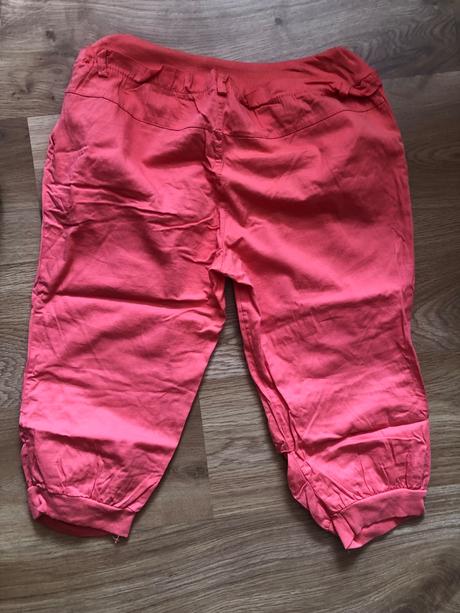 Tristvrtove nohavice, l