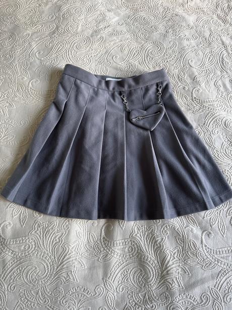 Tepla sklamaná sukňa s vreckom srdiečko, reserved,146