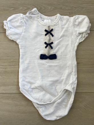 Body s mašličkami, 74