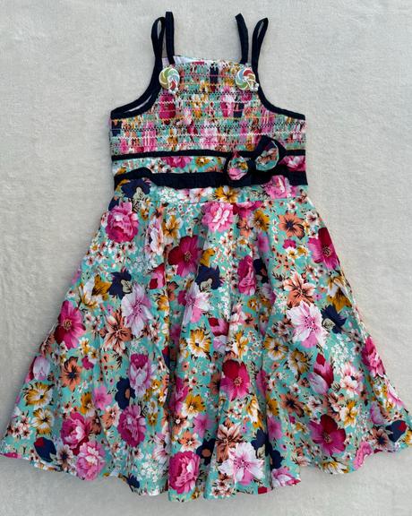 Kvietkované šaty, 134