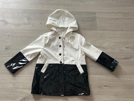 Prechodna protidazdova bundicka, 104