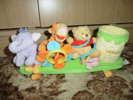 Hračka na madlo kočiara, 