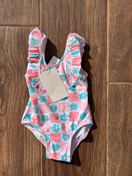 Zara plavky s visačkou a decatlon tanečny dres, 