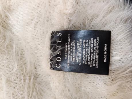 Vesta z obsahom peria, 42