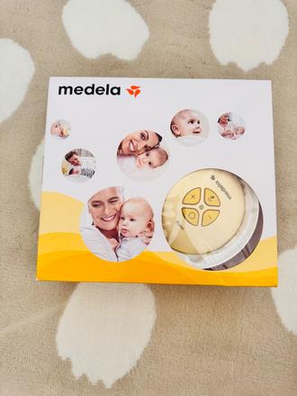 Elektrická odsávačka medela swing, 