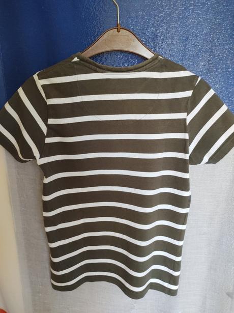 Tričko s pásikmi, 146