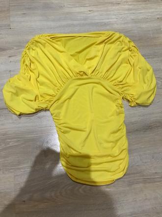 Zaujímavé zlte tričko s az m, s