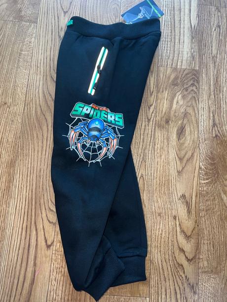 Vyteplene teplaky s reflexnym pasikom, 116