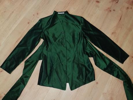 Smaragdové sako, 36