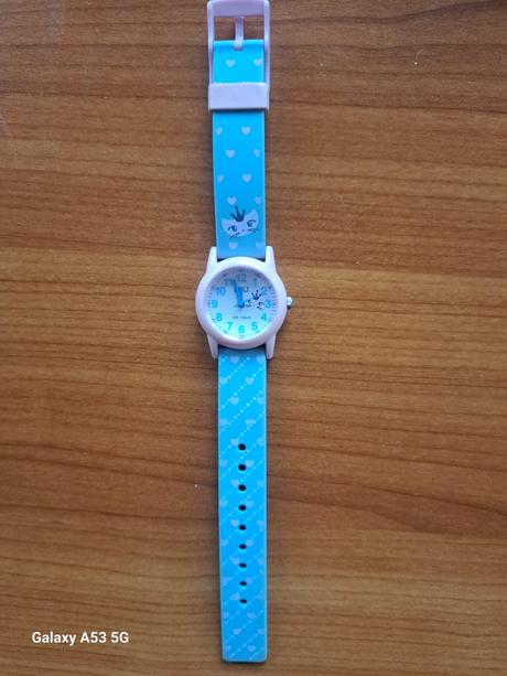 Hodinky s macickou zn.q / q, 