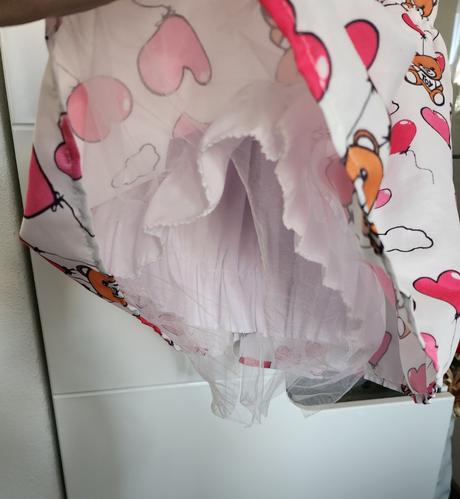 Rozkošné šaty, 122