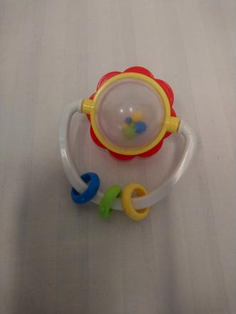 Farebná hrkálka kvetina s guličkami v strede, 9 cm, 