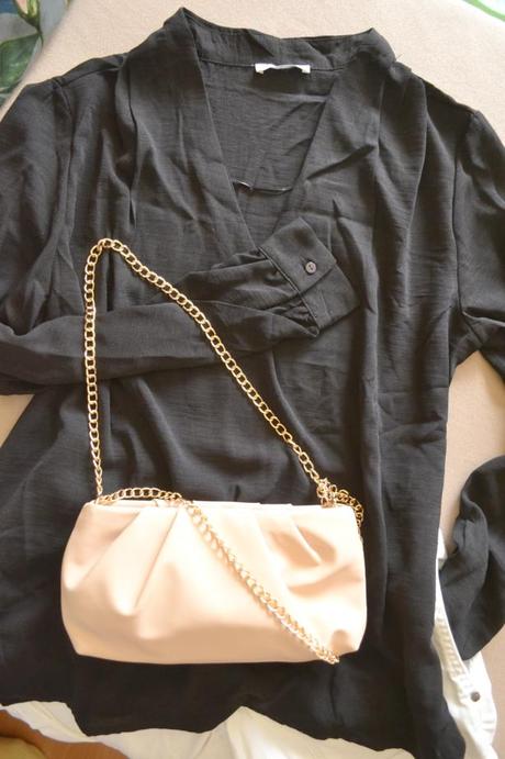 Dlhšia sýtočierna raz použitá blúzka s/l, m