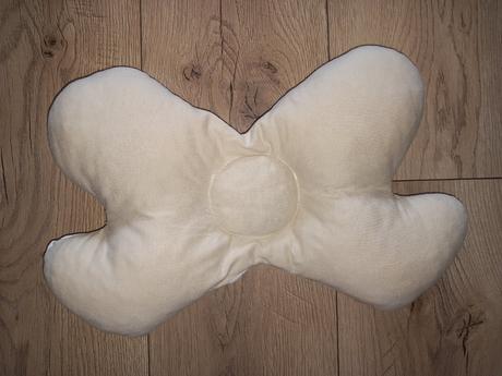 Vankúš do autosedačky,