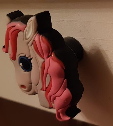 Ruzova uchytka konik+2 koncovky na garnize, 