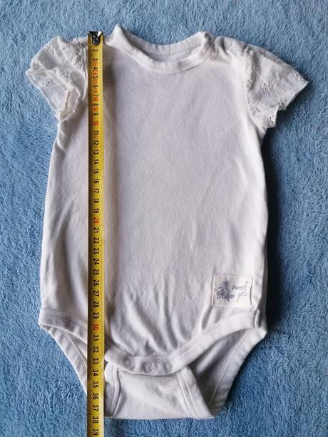 Body s okrasnými rukávmi, 74