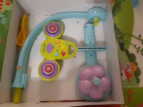 Kolotoč na postieľku taf toys, 