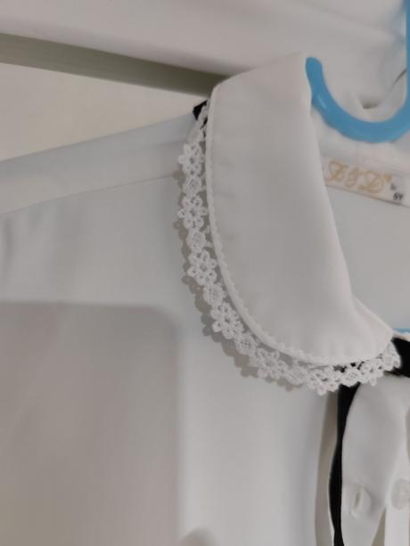 Biela košieľka s maslickou, 122