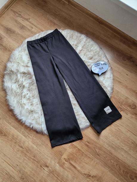 Široké vrubkove nohavice, 164