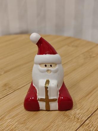 Zberateľ retro keramická figúrka santa na darčeku,