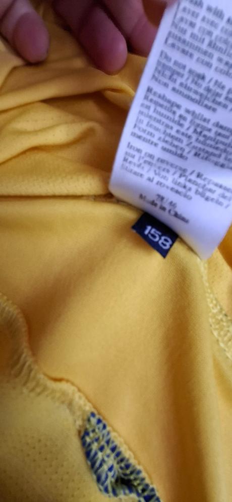 Football shirt by umbro, 158