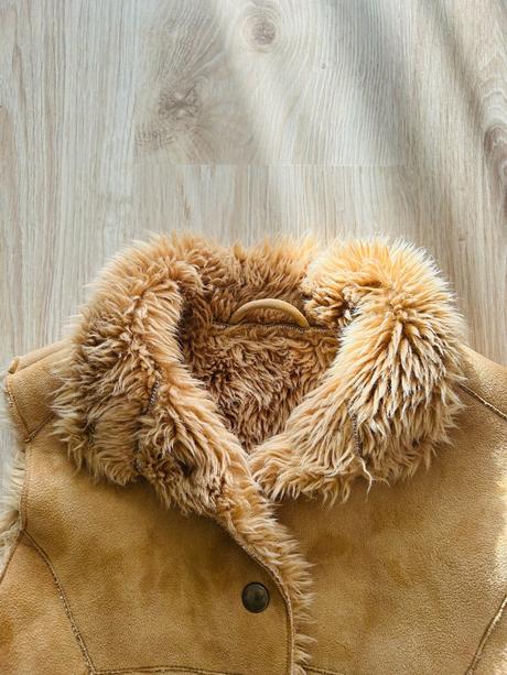 Skvelá kožušinková vesta značky marks & spencer, marks & spencer,116