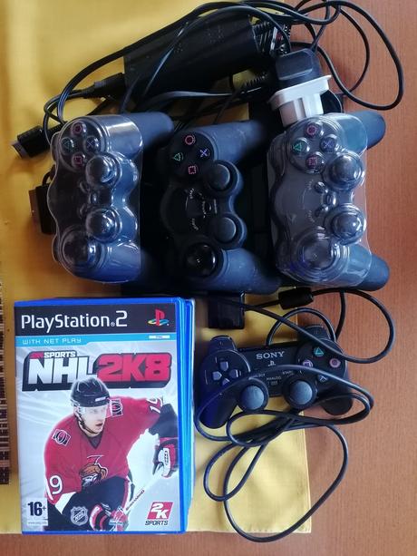 Herná konzola ps2 + hry 7 ks,