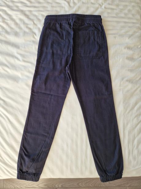 25ša_nohavice s kapsami, h&m,140