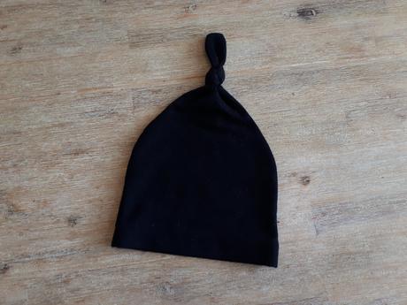 Prechodná čierna čiapka, 68