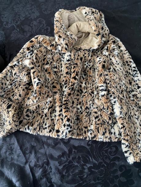 Tenší kožuštek, m