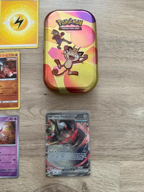 Balík pokémom kariet - 50 kariet a kovová tinka, 