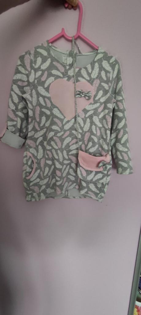 Šaty s kabelkou, 116