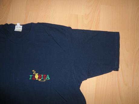 Tmavomodre tricko, 164