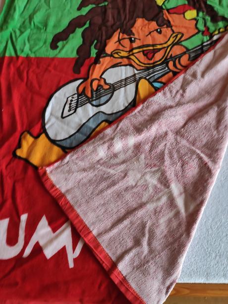 Osuška v ruksaku na pláž, 