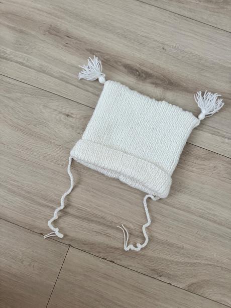 Hačkovana čiapočka, 68