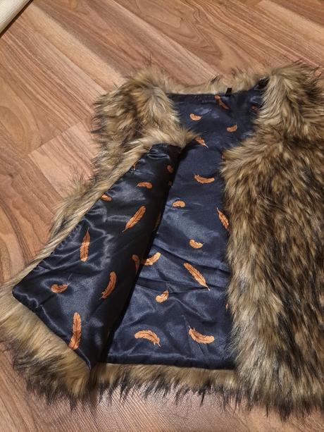 Vesta z kožušiny, 164