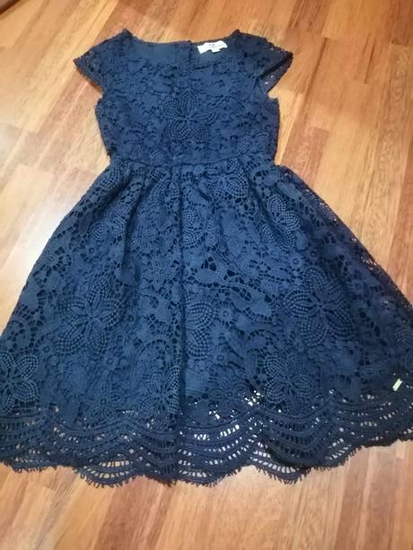 Šaty s poštou, 134