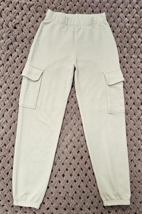 Béžové kapsáčové tepláky, h&m,140