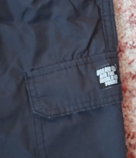 Čierne tenké nohavice kapsáče, h&m,152