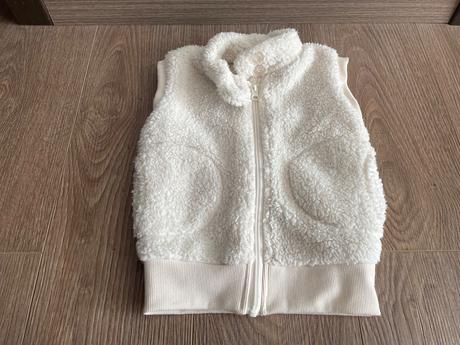 Biela vesta, lupilu,98