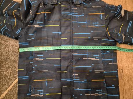 Lyziarska vetrovka, 122