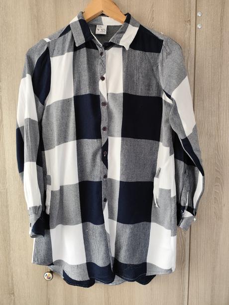 Predĺžená košeľa, 158