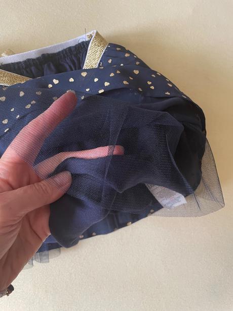 Sukna so zlatymi srdieckami, 110