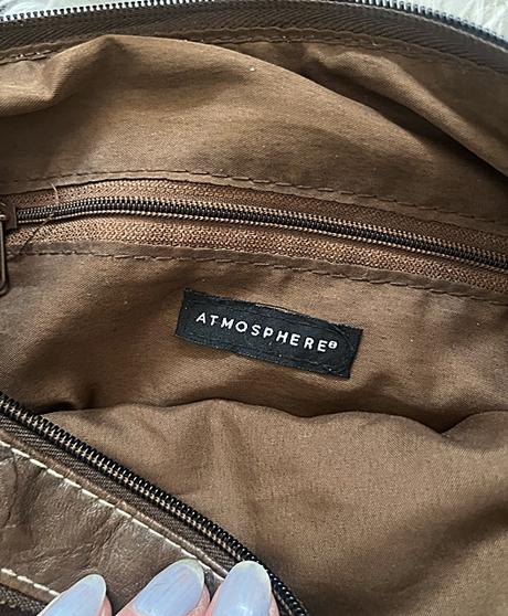 Crossbody atmosphere, atmosphere