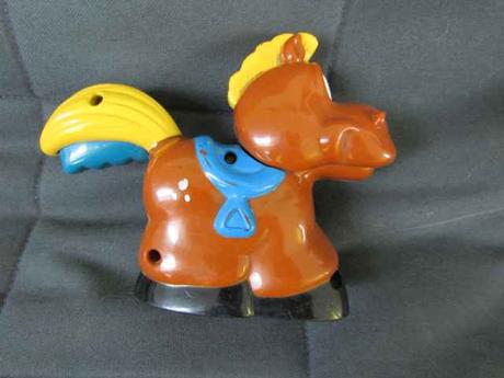 Koník - baterka od fisher price,