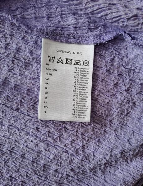 Šaty s dlhým rukávom v pastelovo-fialovej farbe, 152