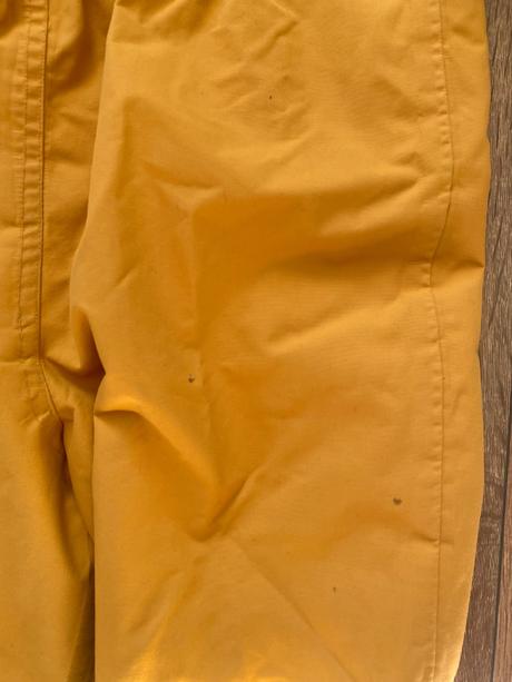 Kombinéza do dažďa, 92