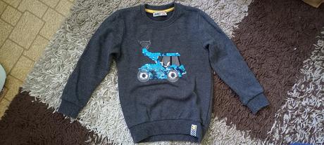 Sveter s nakladačom, 104