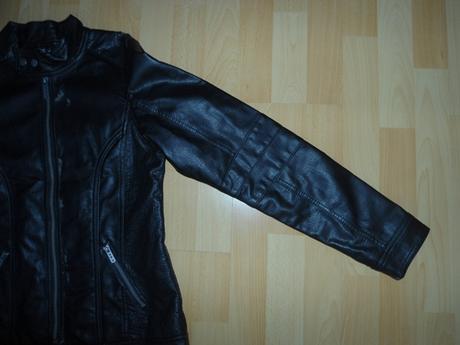 Cierna kozenkova bunda, 176